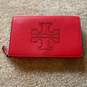 Good Condition- Tory Burch Small Crossbody Bag in a Red/Orangish color